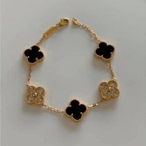 Gold plated black clover and pave bracelet. New.